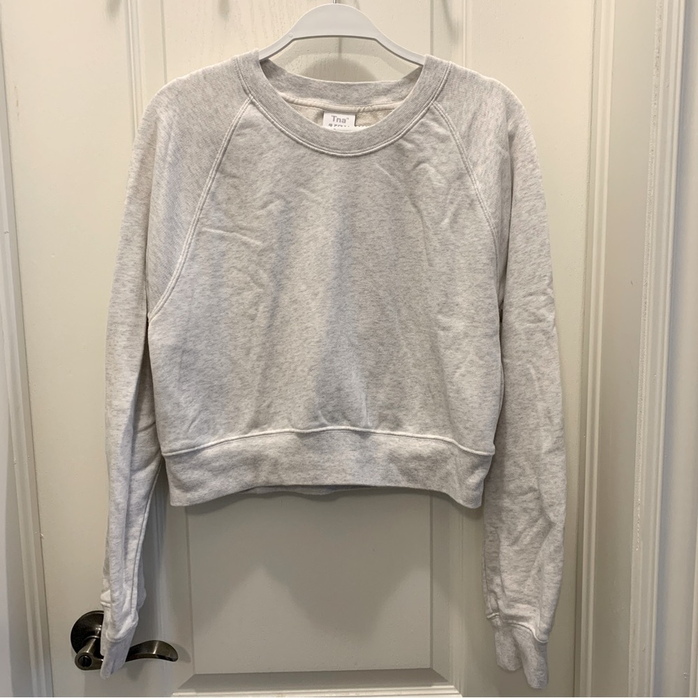 aritzia/tna cropped white fleece sweatshirt